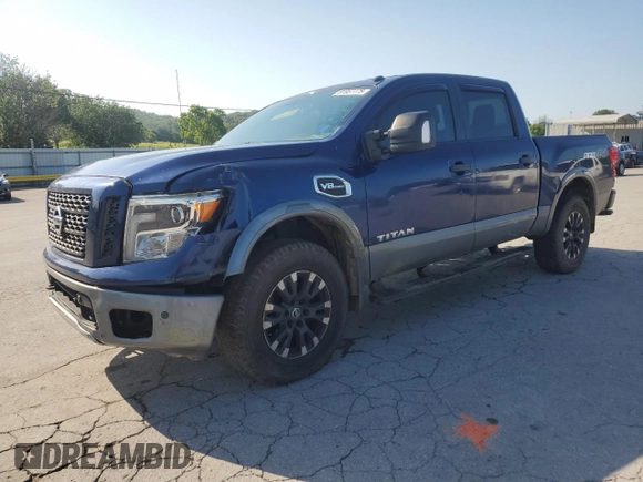 2017 Nissan Titan Pro-4X with VIN 1N6AA1E5XHN544948, listed as a Copart auction lot 61851175 with 216,797 mi miles and Clean title. Bid and sale history available at DreamBid. Image 1.