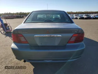 2000 Mitsubishi Galant LS with VIN 4A3AA56LXYE174881, listed as a Copart auction lot 79727154 with 106,001 mi miles and Salvage Title. Bid and sale history available at carsss.com. Image 6.