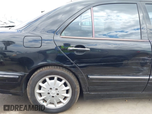 2001 Mercedes-Benz E 320 with VIN WDBJF65J91B363439, listed as a IAAI auction lot 42058536 with 61,272 mi miles and . Bid and sale history available at DreamBid. Image 19.
