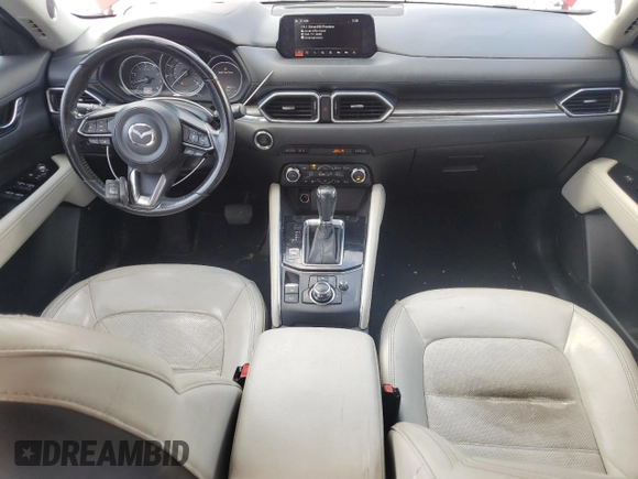 2018 Mazda CX-5 Grand Touring с VIN JM3KFBDM1J0332117, выставлен на аукционе Copart как лот 59379085 с пробегом 95 527 миль миль и Списание • Salvage title. История ставок и продаж доступна на DreamBid. Изображение 8.