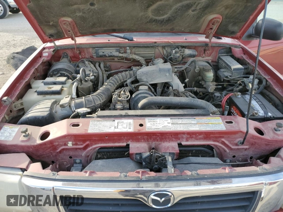 1998 Mazda B-Series Truck SX z VIN 4F4YR12C5WTM39439, wystawiony jako Copart lot #85689024 z przebiegiem 125 357 mil mil oraz Czysty tytuł • Clean title. Historia ofert i sprzedaży dostępna na DreamBid. Obrazek 11.
