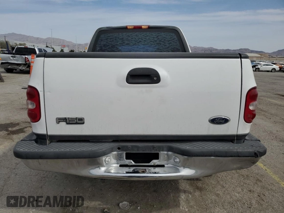 1999 Ford F-150 XL with VIN 1FTZX0721XKA49751, listed as a Copart auction lot 52429195 with Not provided miles and Salvage title. Bid and sale history available at DreamBid. Image 6.