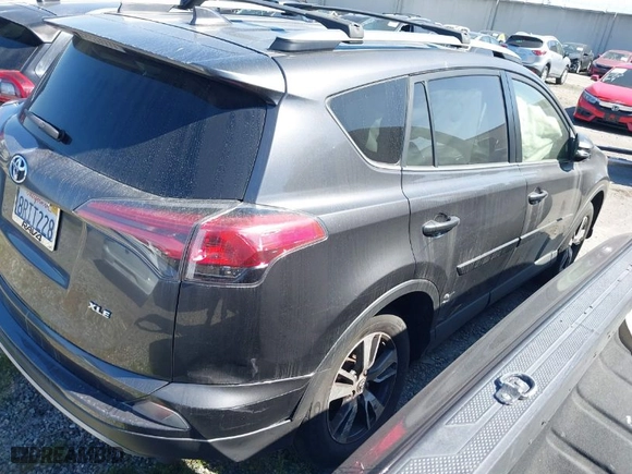 2018 Toyota RAV4 XLE with VIN JTMWFREV4JJ168138, listed as a IAAI auction lot 41845337 with 122,509 mi miles. Bid and sale history available at carsss.com. Image 4.