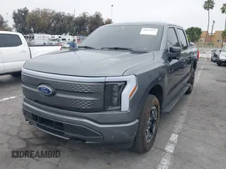2023 Ford F-150 Lightning Pro with VIN 1FTVW1EL8PWG48559, listed as a IAAI auction lot 42033123 with 8,845 mi miles and . Bid and sale history available at DreamBid. Image 21.