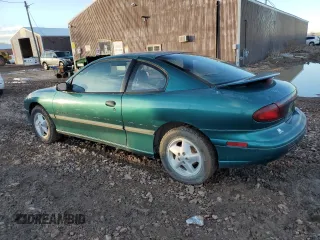 1997 Pontiac Sunfire SE z VIN 1G2JB12T9V7579374, wystawiony jako Copart lot #41468144 z przebiegiem 153 533 mil mil oraz Tytuł czysty. Historia ofert i sprzedaży dostępna na DreamBid. Obrazek 2.