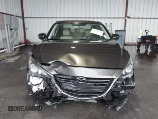2015 Mazda 3 i Touring with VIN 3MZBM1V72FM215729, listed as a IAAI auction lot 42191673 with 141,471 mi miles and . Bid and sale history available at DreamBid. Image 13.