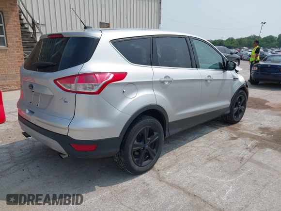 2014 Ford Escape SE with VIN 1FMCU9GX9EUD83148, listed as a IAAI auction lot 42449815 with 120,062 mi miles and . Bid and sale history available at DreamBid. Image 4.