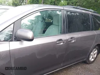 2015 Toyota Sienna LE AAS with VIN 5TDKK3DC8FS632906, listed as a IAAI auction lot 42533867 with 128,980 mi miles and . Bid and sale history available at DreamBid. Image 14.