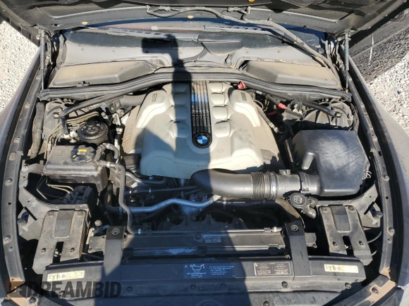 2004 BMW 6 Series 645Ci z VIN WBAEH73414B189402, wystawiony jako Copart lot #76869484 z przebiegiem 109 145 mil mil oraz Czysty tytuł • Clean title. Historia ofert i sprzedaży dostępna na DreamBid. Obrazek 11.