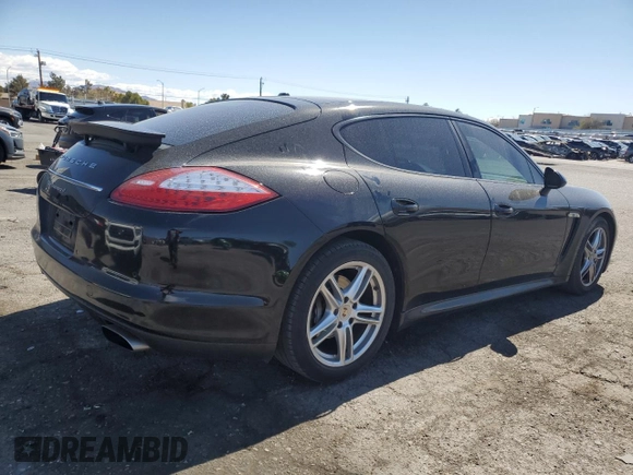 2012 Porsche Panamera z VIN WP0AA2A73CL071401, wystawiony jako Copart lot #49864355 z przebiegiem 95 142 mil mil oraz Czysty tytuł • Clean title. Historia ofert i sprzedaży dostępna na DreamBid. Obrazek 3.