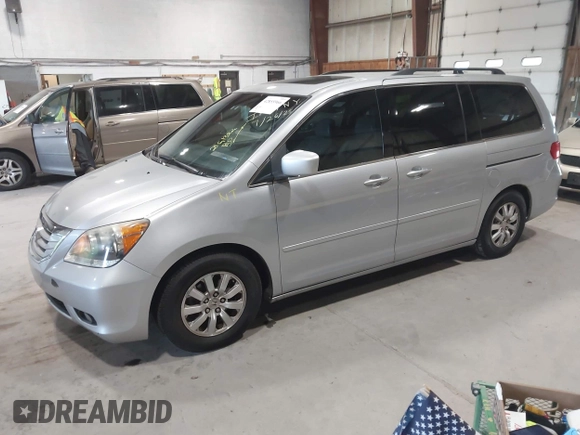2010 Honda Odyssey EX-L z VIN 5FNRL3H75AB009698, wystawiony jako IAAI lot #42855966 z przebiegiem 215 138 mil mil oraz . Historia ofert i sprzedaży dostępna na DreamBid. Obrazek 2.