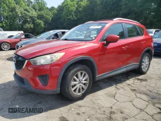 2014 Mazda CX-5 Sport with VIN JM3KE2BE1E0414739, listed as a Copart auction lot 60251735 with 122,784 mi miles and Salvage title. Bid and sale history available at DreamBid. Image 1.