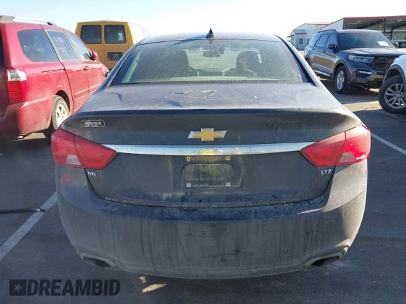 2015 Chevrolet Impala LTZ with VIN 2G1165S31F9175789, listed as a IAAI auction lot 41695378 with 128,444 mi miles and . Bid and sale history available at DreamBid. Image 17.