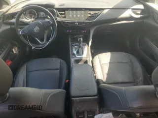 2018 Buick Regal Essence with VIN W04GP6SX9J1144630, listed as a Copart auction lot 53074585 with 96,077 mi miles and Salvage title. Bid and sale history available at DreamBid. Image 8.