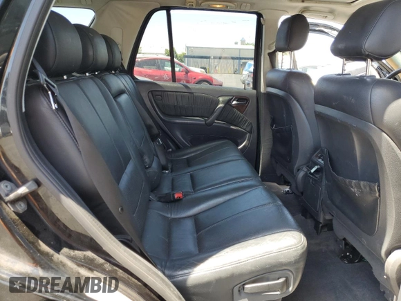 2000 Mercedes-Benz M 320/430/500 with VIN 4JGAB72EXYA193906, listed as a Copart auction lot 62025125 with 142,808 mi miles and Salvage title. Bid and sale history available at DreamBid. Image 11.
