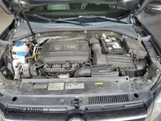 2014 Volkswagen Passat S z VIN 1VWAT7A36EC106565, wystawiony jako Copart lot #53965625 z przebiegiem 130 936 mil mil oraz Szkoda całkowita • Salvage title. Historia ofert i sprzedaży dostępna na DreamBid. Obrazek 11.
