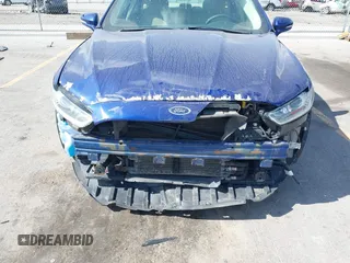 2014 Ford Fusion SE Hybrid с VIN 3FA6P0LU9ER129016, выставлен на аукционе IAAI как лот 42269103 с пробегом 170 001 миль миль и . История ставок и продаж доступна на DreamBid. Изображение 6.
