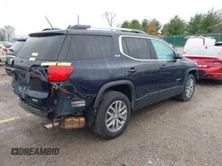2017 GMC Acadia SLE with VIN 1GKKNSLAXHZ281407, listed as a IAAI auction lot 41911752 with 142,418 mi miles. Bid and sale history available at carsss.com. Image 4.