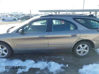 2003 Ford Taurus SE Standard with VIN 1FAFP58U73A279364, listed as a IAAI auction lot 41500005 with 148,781 mi miles. Bid and sale history available at carsss.com. Image 6.