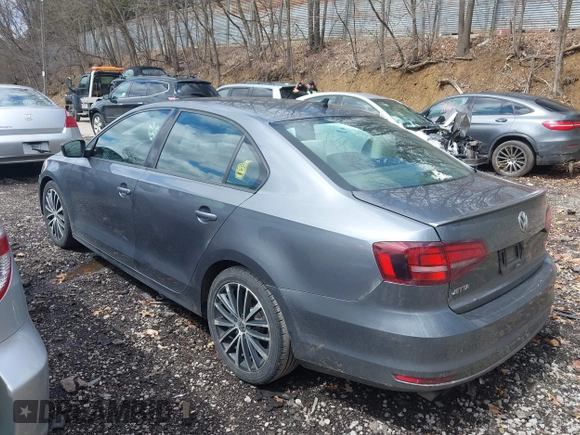 2016 Volkswagen Jetta Sport z VIN 3VWD17AJ7GM225289, wystawiony jako IAAI lot #41978267 z przebiegiem 142 556 mil mil oraz . Historia ofert i sprzedaży dostępna na DreamBid. Obrazek 14.