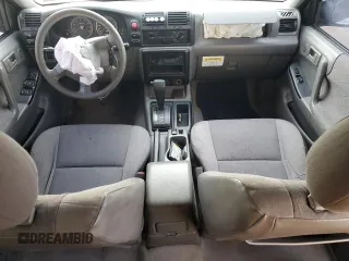 2003 Isuzu Rodeo with VIN 4S2DM58W034303129, listed as a Copart auction lot 83757734 with 114,274 mi miles and Salvage Title. Bid and sale history available at DreamBid. Image 8.