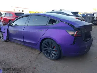 2021 Tesla Model 3 Performance with VIN 5YJ3E1EC0MF050802, listed as a IAAI auction lot 40577770 with 1 mi miles. Bid and sale history available at carsss.com. Image 3.