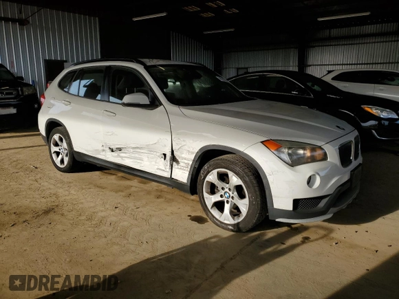 2015 BMW X1 sDrive28i with VIN WBAVM1C50FVW58031, listed as a Copart auction lot 48552735 with 205,392 mi miles and Salvage Title. Bid and sale history available at carsss.com. Image 4.