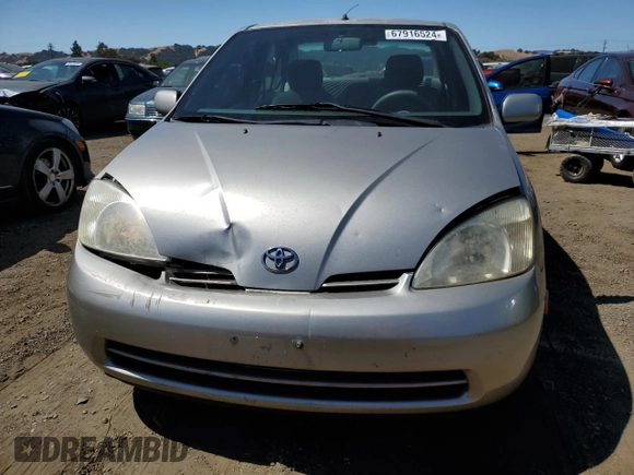 2002 Toyota Prius with VIN JT2BK18U320065095, listed as a Copart auction lot 67916524 with 219,451 mi miles and Salvage Title. Bid and sale history available at carsss.com. Image 5.