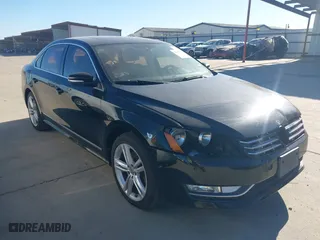 2014 Volkswagen Passat SEL Premium with VIN 1VWCS7A39EC080409, listed as a IAAI auction lot 40917278 with 140,783 mi miles. Bid and sale history available at carsss.com. Image 1.
