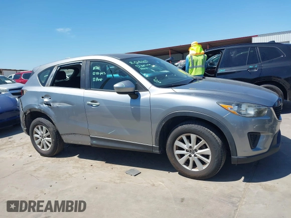 2014 Mazda CX-5 Sport with VIN JM3KE2BE7E0371203, listed as a IAAI auction lot 42243756 with 121,534 mi miles and . Bid and sale history available at DreamBid. Image 14.