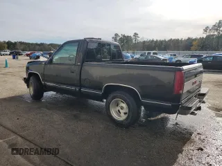 1991 GMC Sierra 1500 with VIN 1GTDC14H4MZ526745, listed as a Copart auction lot 82861084 with 227,672 mi miles and Salvage Title. Bid and sale history available at DreamBid. Image 2.