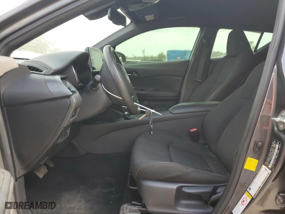 2019 Toyota C-HR XLE with VIN JTNKHMBX2K1039104, listed as a Copart auction lot 54169665 with 65,879 mi miles and Clean Title. Bid and sale history available at carsss.com. Image 7.