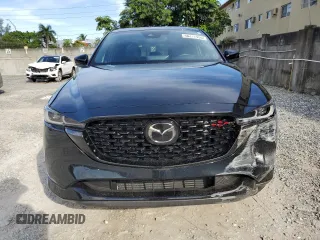 2022 Mazda CX-5 2.5 Turbo with VIN JM3KFBAY8N0619340, listed as a Copart auction lot 46217955 with 13,604 mi miles and Salvage Title. Bid and sale history available at carsss.com. Image 5.
