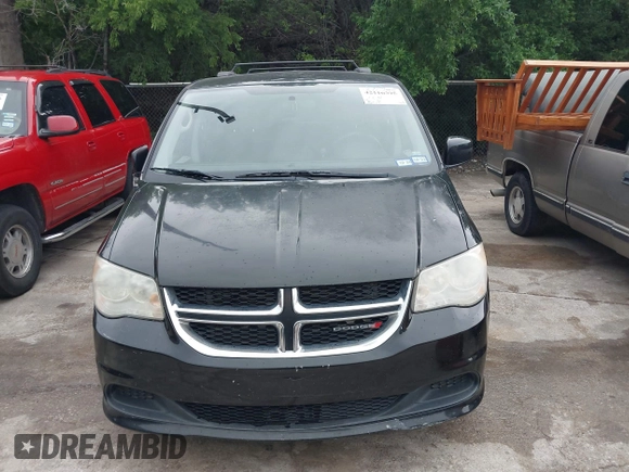 2013 Dodge Grand Caravan SXT with VIN 2C4RDGCG0DR552784, listed as a IAAI auction lot 42116395 with 96,917 mi miles and . Bid and sale history available at DreamBid. Image 6.