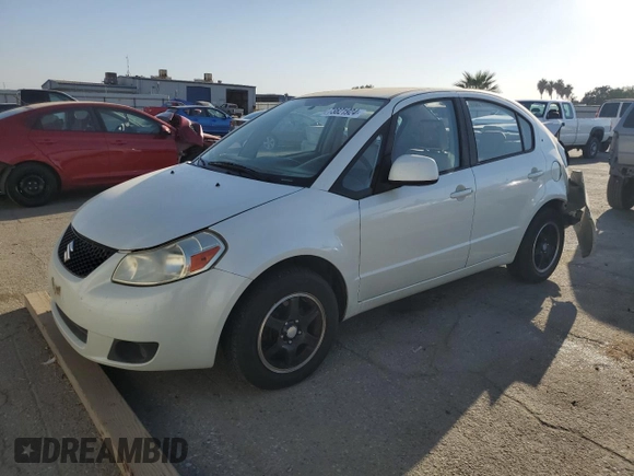 2009 Suzuki SX4 Man FWD with VIN JS2YC412796200908, listed as a Copart auction lot 73821924 with 125,721 mi miles and Salvage Title. Bid and sale history available at carsss.com. Image 1.