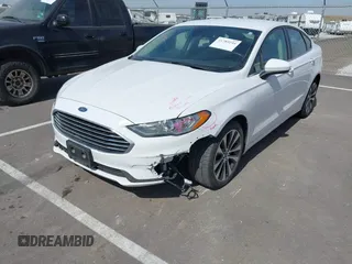 2020 Ford Fusion SE with VIN 3FA6P0T92LR249765, listed as a IAAI auction lot 41789244 with 50,027 mi miles and . Bid and sale history available at DreamBid. Image 6.