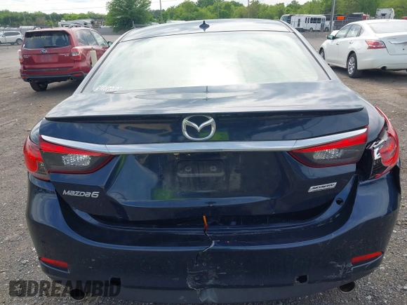 2015 Mazda 6 i Grand Touring with VIN JM1GJ1W53F1200121, listed as a IAAI auction lot 42173036 with 76,184 mi miles and . Bid and sale history available at DreamBid. Image 6.