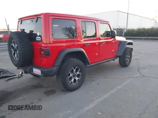 2022 Jeep Wrangler Unlimited Rubicon with VIN 1C4HJXFN4NW261809, listed as a IAAI auction lot 41459519 with 30,422 mi miles and . Bid and sale history available at DreamBid. Image 4.