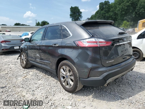 2020 Ford Edge Titanium with VIN 2FMPK3K9XLBB60780, listed as a Copart auction lot 62354735 with 60,328 mi miles and Salvage title. Bid and sale history available at DreamBid. Image 2.