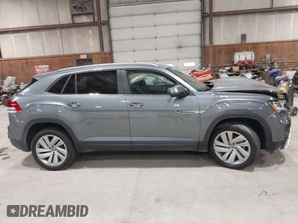 2022 Volkswagen Atlas SE z VIN 1V2KE2CA1NC206765, wystawiony jako IAAI lot #41876747 z przebiegiem 83 304 mil mil oraz . Historia ofert i sprzedaży dostępna na DreamBid. Obrazek 13.