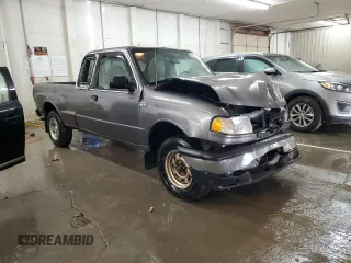2000 Mazda B-Series 2WD Truck SE with VIN 4F4YR16V8YTM12086, listed as a Copart auction lot 82609244 with 297,354 mi miles and Salvage Title. Bid and sale history available at carsss.com. Image 4.