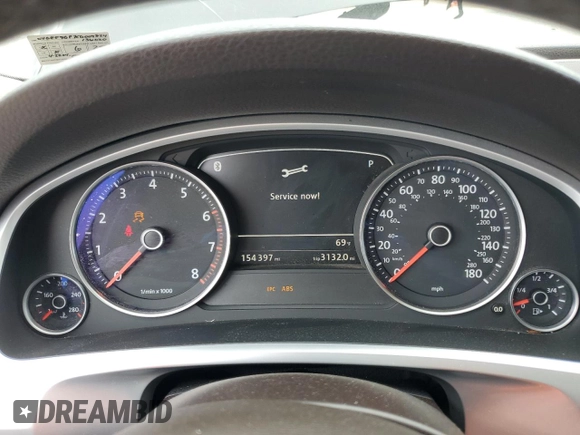 2012 Volkswagen Touareg Sport z VIN WVGEF9BP7CD009824, wystawiony jako Copart lot #58311915 z przebiegiem 154 397 mil mil oraz Szkoda całkowita • Salvage title. Historia ofert i sprzedaży dostępna na DreamBid. Obrazek 9.