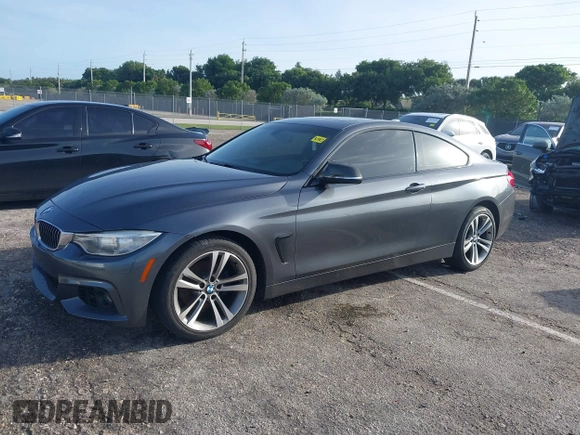 2014 BMW 4 Series 428i xDrive with VIN WBA3N5C57EK196790, listed as a IAAI auction lot 40571670 with 108,114 mi miles and . Bid and sale history available at DreamBid. Image 2.