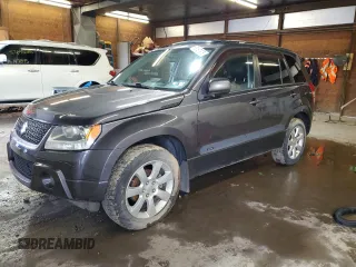 2012 Suzuki Grand Vitara Limited z VIN JS3TD0D79C4100640, wystawiony jako Copart lot #58167975 z przebiegiem 138 376 mil mil oraz Tytuł czysty. Historia ofert i sprzedaży dostępna na DreamBid. Obrazek 1.