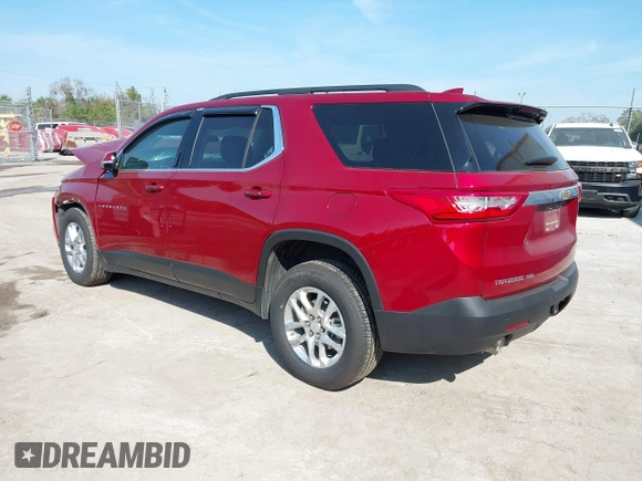 2021 Chevrolet Traverse LT Cloth with VIN 1GNEVGKW1MJ100973, listed as a IAAI auction lot 41477074 with 56,167 mi miles. Bid and sale history available at carsss.com. Image 3.