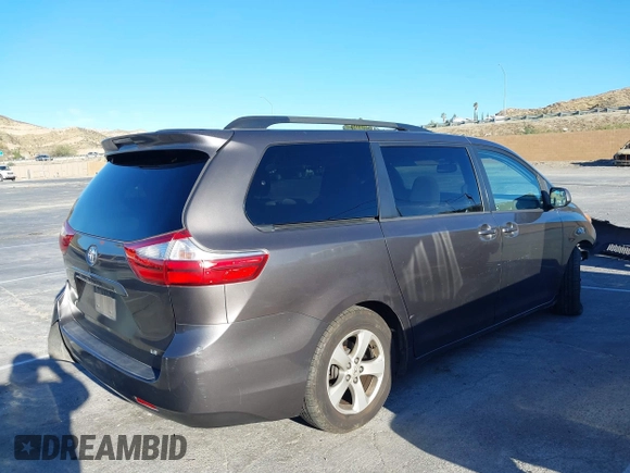 2015 Toyota Sienna LE AAS with VIN 5TDKK3DC3FS529845, listed as a IAAI auction lot 41627102 with 130,334 mi miles. Bid and sale history available at carsss.com. Image 4.