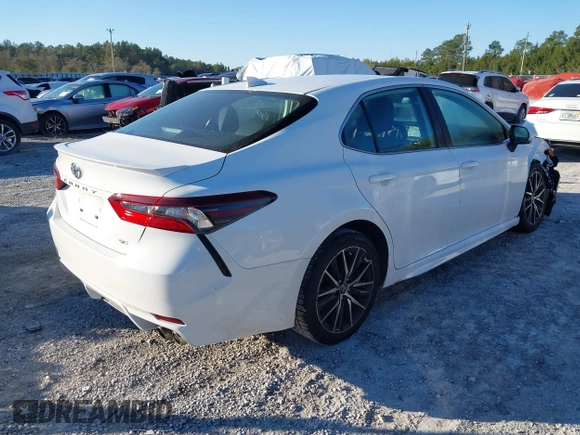 2023 Toyota Camry SE z VIN 4T1G11AKXPU153288, wystawiony jako IAAI lot #41816589 z przebiegiem 33 708 mil mil oraz . Historia ofert i sprzedaży dostępna na DreamBid. Obrazek 4.