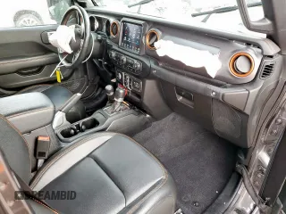 2020 Jeep Gladiator Mojave z VIN 1C6JJTEG8LL207481, wystawiony jako Copart lot #58009665 z przebiegiem 57 479 mil mil oraz Szkoda całkowita • Salvage title. Historia ofert i sprzedaży dostępna na DreamBid. Obrazek 8.