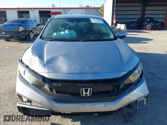 2020 Honda Civic LX with VIN 19XFC2F63LE004953, listed as a IAAI auction lot 41824922 with 71,458 mi miles and . Bid and sale history available at DreamBid. Image 12.