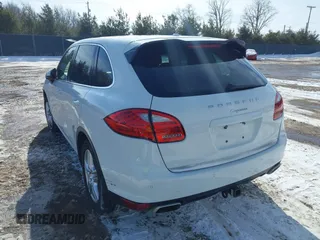 2014 Porsche Cayenne with VIN WP1AA2A2XELA95734, listed as a IAAI auction lot 41583908 with 95,751 mi miles and . Bid and sale history available at DreamBid. Image 3.